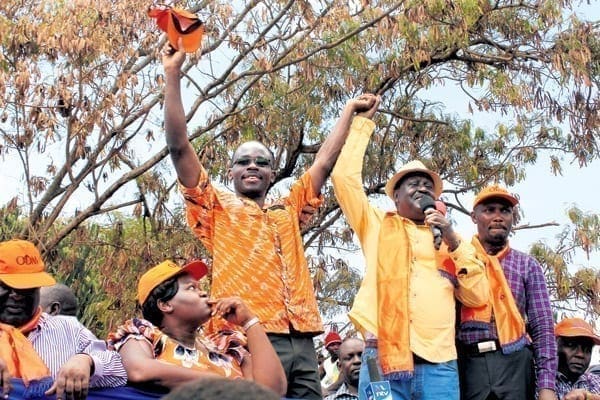 ODM leader Raila Odinga and Budalang’i MP Ababu Namwamba after attending a parliamentary group meeting at Boma Hotel in Nairobi on July 22, 2014. FILE PHOTO | EVANS HABIL