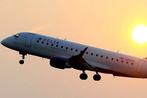 A Delta airlines' aircraft takes off from the Ronald Reagan National airport as the sun rises in Washington, DC. PHOTO | AFP