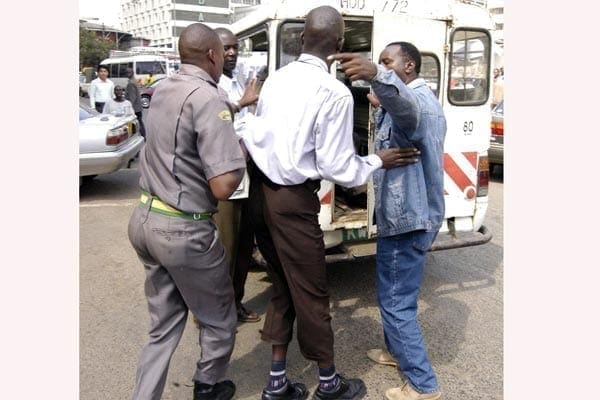 Image result for Police assaulting hawkers in nairobi