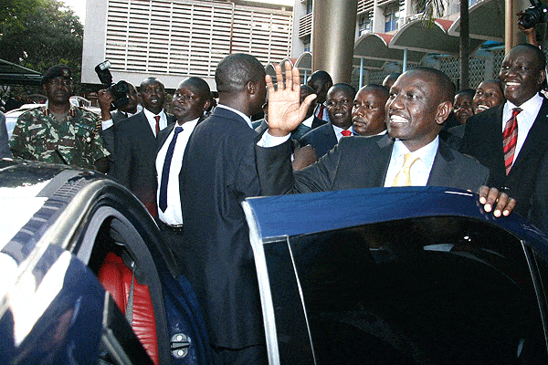 Acting President William Ruto waves to a cheering crowd outside Harambee house on October 6, 2014. PHOTO | BILLY MUTAI