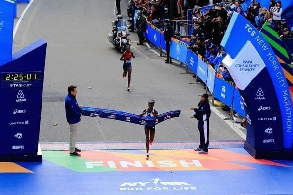 Mary Keitany crosses the finish line to win the women's division during the 2014 TCS New York City Marathon in Central Park on November 2, 2014 in New York City. PHOTO | ALEX TRAUTWIG