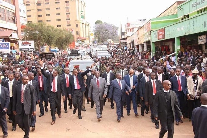 Photos: Uhuru meet and greet tour of Kisii attract large crowd: Business came to a standstill in Kisii town as a large crowd of people came out to see President Uhuru Kenyatta as he walked on the streets