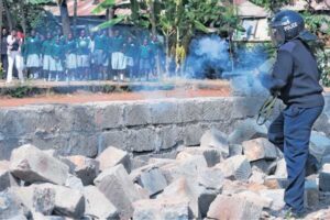 Police teargas pupils