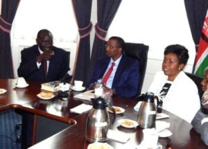 (IEBC) Chairman Mr. Isaack Hassan (2nd from far right),Kenya High Commissioner in the UK HE Lazarus Amayo (third from far right),deputy High Commissioner in the UK Ambassador Jackline Yonga (far right)
