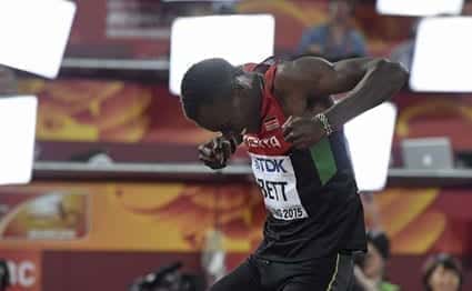 Kenya's Nicholas Bett savours victory after winning the final of the men's 400 metres hurdles athletics event at the 2015 IAAF World Championships at the 