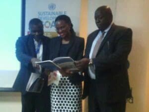 Pic 1 - Economic Advisor UN-Country Team Wilmot Reeves (left), Standard Chatered Bank-Kenya Brand & Marketing OLga Arara-KImani and Director at the Devolution Ministry Gideon Mailu at the Intercontinental Hotel in Nairobi.