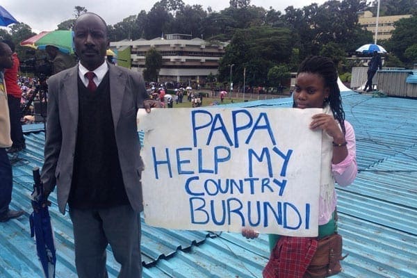 Michael and Shanelle who came all the way to Kenya from Burundi because they want the pontiff to go and preach peace there as they fear the country could plunge into civil war leading to a genocide. PHOTO | NGARE KARIUKI | NATION MEDIA GROUP