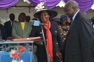 Retired president Mwai Kibaki and Othaya MP Mary Wambui during her sister Anne Wakarima's funeral service at Gatugi PCEA church on Friday. Photo/WAMBUGU KANYI