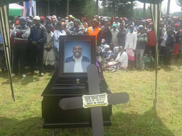 Mourners gather for the burial of the late taxi driver Joseph Muiruri at his home in Rwanyambo village, Mukei location on Saturday, July 9, 2016. Photo/Carol Maina 