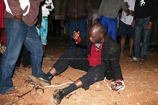 The preacher, Sammy Ndwiga, moments after he was beaten by the irate mob. PHOTO | CORRESPONDENT