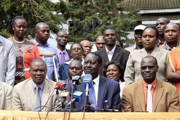 Cord leader Raila Odinga with members of the Kisii community living in Nairobi at a press conference at Orange House in the city on August 9, 2016. PHOTO | DIANA NGILA | NATION MEDIA GROUP