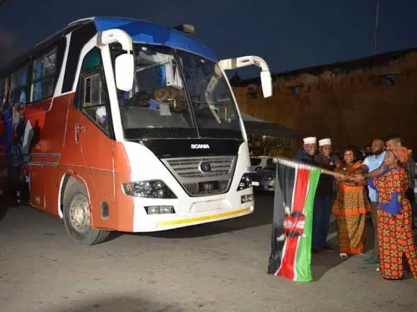 Mombasa Governor Hassan Joho flags off a bus that will be used to pick delegates to attend ODM's 10th anniversary to be held in Mombasa on Saturday. He was accompanied by other ODM MPs, September 8, 2016 /JOHN CHESOLI