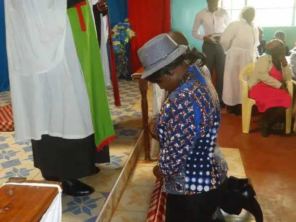 Runyenjes MP Cecily Mbarire is prayed for at the National Independent Church of Africa, Kairuri, on Sunday /REUBEN GITHINJI