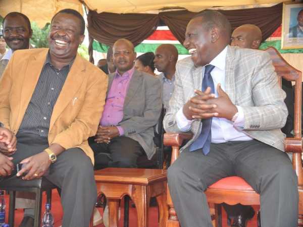 DP William Ruto chat with Amani coalition leader Musalia Mudavadi at a past event. /FILE