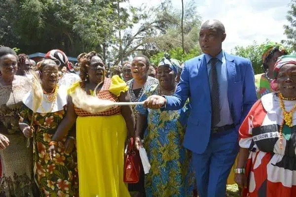 Former Mungiki leader Mr Maina Njenga joins women in a traditional jig at Karandi area in Laikipia west, Laikipia County on August 29, 2016. Mr Njenga was on September 5, 2016 blocked from an event attended by Director of Criminal Investigations Ndegwa Muhoro. PHOTO | STEVE NJUGUNA | NATION MEDIA GROUP