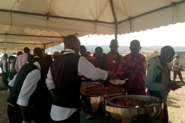 Mourners queue for food at the funeral ceremony of the late William ole Ntimama in Narok. PHOTO | SULEIMAN MBATIAH | NATION MEDIA GROUP