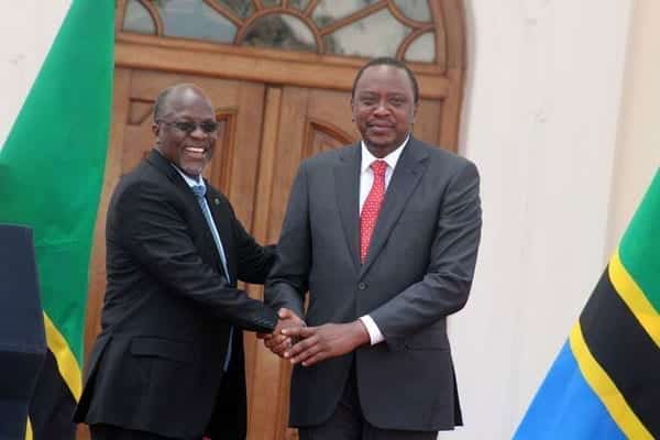 Presidents Uhuru Kenyatta and Tanzania's John Pombe Magufuli at State house Nairobi on October 31, 2016. Tanzania and Kenya have agreed on a time line to start the construction of two link roads. PHOTO DENNIS ONSONGO | NATION MEDIA GROUP