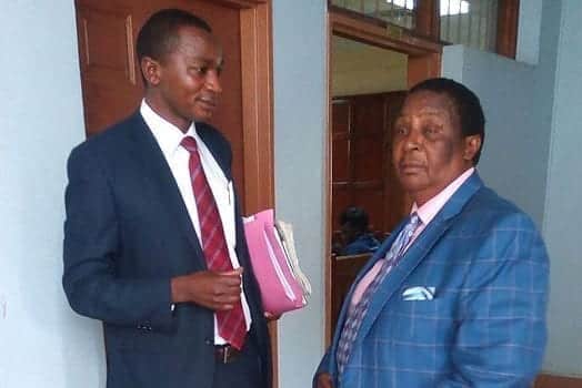 Ntimama's son,Mr George Kariuki Njoroge (right) and his lawyer Nchogu Omwanza (left) outside court on October 25, 2016. PHOTO | MAUREEN KAKAH