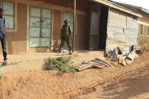A policeman at the scene where a man was shot dead as the police engaged Al-Shabaab militants in Mandera Town in a fight on October 18, 2016. The militants dressed in hijabs were on unknown mission when they encountered police attached to Mandera Governor Ali Roba. PHOTO | MANASE OTSIALO | NATION MEDIA GROUP.