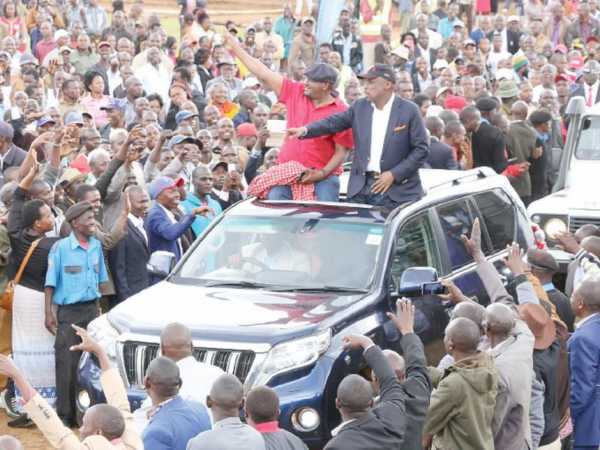 Kanu secretary general Nick Salat and Baringo Senator Gideon Moi arrive atop a vehicle for Governor Isaac Rutto’s prayer rally at Bomet Stadium yesterday /FELIX KIPKEMOI
