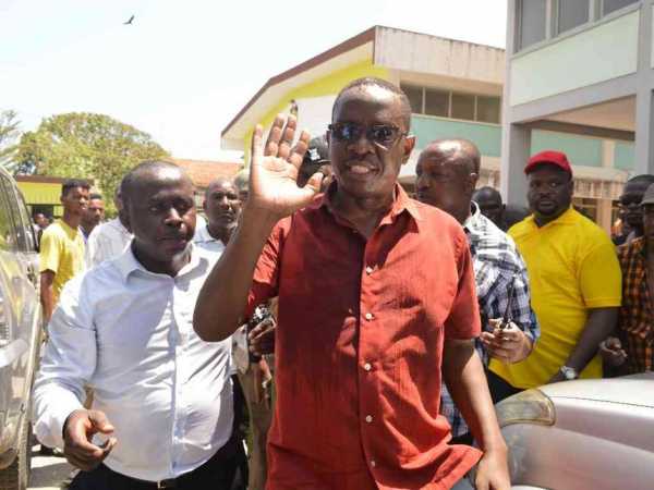 Former TNA party secretary general Onyango Oloo walks out of Kenya school of government hall after Jubilee party  grass roots elections turns chaotic in Mombasa on December 14,2016.Photo / JOHN CHESOLI