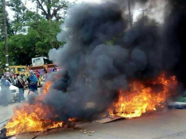 A fire lit by Kalundu market traders in a protest against the demolition of their structures, during which former Kitui mayor Martha Mwangangi was crushed to death, December 16, 2016. /COURTESY