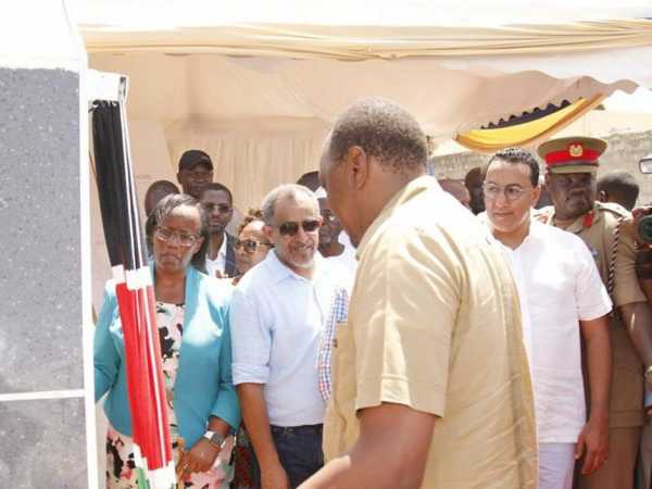 Suleiman Shahbal [in spectacles] looks on as President Uhuru Kenyatta commissions the Storm Water Drainage at Bamburi in Mombasa on Thursday, December 6. /BRIAN OTIENO