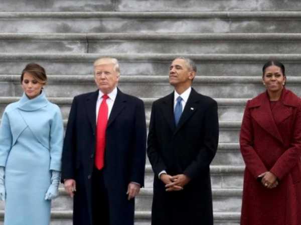 President Donald Trump and former president Barack Obama exchange words at the U.S. Capitol with First Lady Melania Trump and Michelle Obama in Washington, DC., U.S., January 20, 2017. In today's inauguration ceremony Donald J. Trump becomes the 45th president of the United States. REUTERS