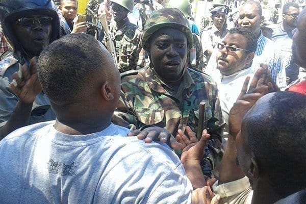 Mr Joho's supporters confront police after