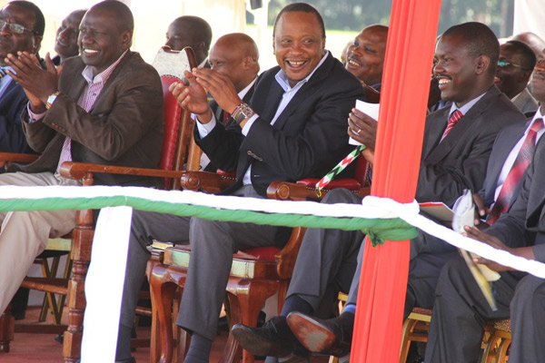 PHOTO | JARED NYATAYA President Kenyatta and Deputy President William Ruto during a rally to thank North Rift residents for voting in the Jubilee government at Eldoret Sports Club on December 16.