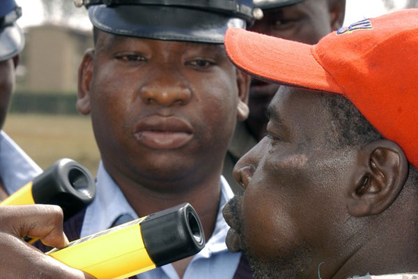 A police officer subjects a man to an alcoblow test during the launch of the programme on February 12, 2005. PHOTO | FILE