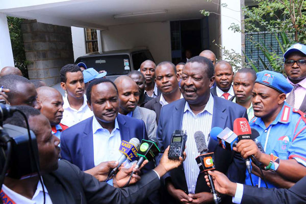 In the wake of a raging storm over the opposition’s presidential flagbearer, Nasa leaders Kalonzo Musyoka (left) and Musalia Mudavadi address the media after meeting at Wiper party headquarters on April 12, 2017. PHOTO | JEFF ANGOTE | NATION MEDIA GROUP