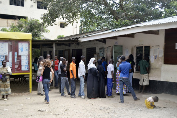 Kenyans queue to collect their national ID cards at a registration office. Now the government says it will register all Kenyans afresh in a digital database. The database will collect biometric details of all those who will be registered including land, establishments and assets. It aims at addressing security issues as well as assist in planning. PHOTO/KEVIN ODIT