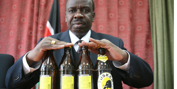 FILE | NATION. John Mututho displays beer bottles with health warning messages.  The National Assembly has approved John Mututho for appointment to Nacada after overturning committee report that had recommended his rejection