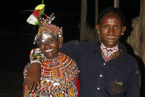 Pascalina Amado and her husband Chuchu Lemarian in Loiyangalani two weeks ago. Chuchu says he considers himself “the toughest moran” in his county for marrying “the most beautiful girl” in the area. PHOTO | ANN KAMONI