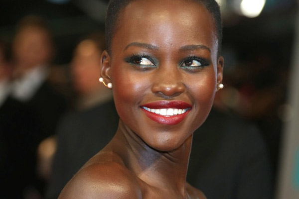 PHOTO | FILE Lupita Nyong’o arrives at the 66th annual British Academy Film Awards (Bafta) at the Royal Opera House in London, Great Britain. Her lipstick sold out in the US at the weekend after she dropped the tube in a fellow actress’ hat.