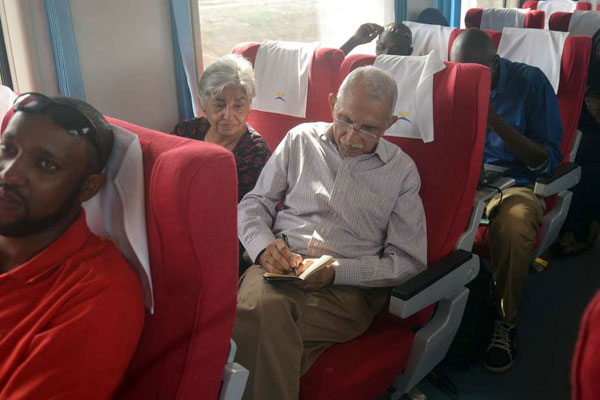 Passengers enjoy their ride aboard the Madaraka Express train from Mombasa to Nairobi