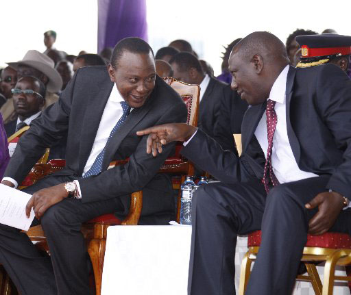 President Uhuru Kenyatta shares a word with his deputy William Ruto at a past function. Kenya’s attempts to free the President and his from attending Hague trials gained momentum Monday night after a fresh draft proposing drastic amendments emerged. Photo/FILE