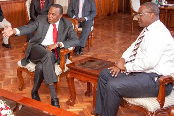 President Kenyatta during his impromptu visit to Nairobi Governor Evans Kidero (right) at the latter’s office at City Hall. A section of ODM politicians consider Dr Evans Odhiambo Kidero a Jubilee mole in their party. But the Nairobi governor vows he is ODM damu even as it appears some politicians are spoiling for a fight with him. PHOTO/FILE