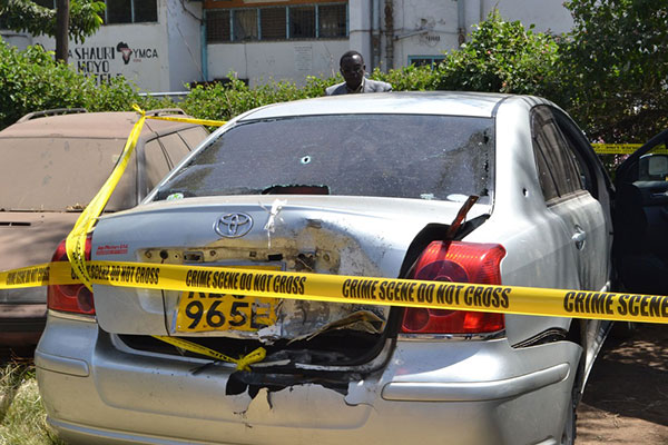 A body of a middle aged man was found on the rear seat of an abandoned bullet-riddled vehicle at around 11pm Thursday. Anti-terror police have launched investigations to establish if the incidence is linked to the explosion at the Jomo Kenyatta International Airport Thursday night.  Above, the car at Shauri Moyo Police Station on January 17, 2014.  Photo/ JEFF ANGOTE