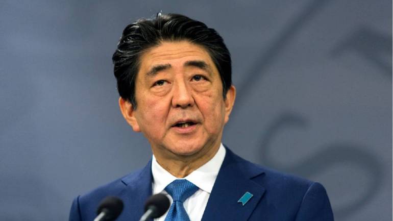 Japan cabinet approves bill to accept foreign workers