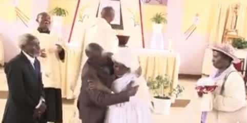 Funny Video: Old Couple Kissing In Church Looks More Like A Fight