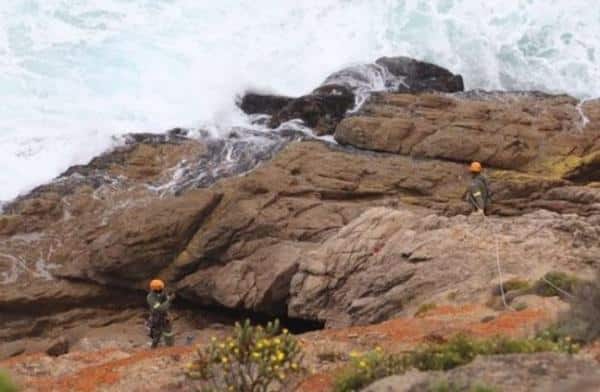 Mum, two children die after car plunges off 300ft cliff into sea