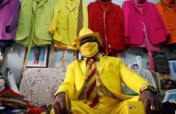Face mask fashion: The man with 160 suits, 200 pairs of shoes & 300 hats