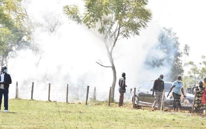 VIDEO: Chaos at Jakoyo Midiwo's Burial, Police teargas Mourners