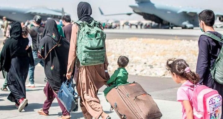 Afghan Refugees Arrive In Uganda Aboard A Privately Chartered Plane