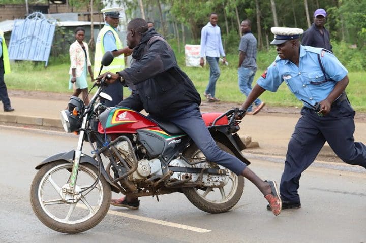 Hilarious CCTV Video: Boda Boda Rider Robbing Police Officer