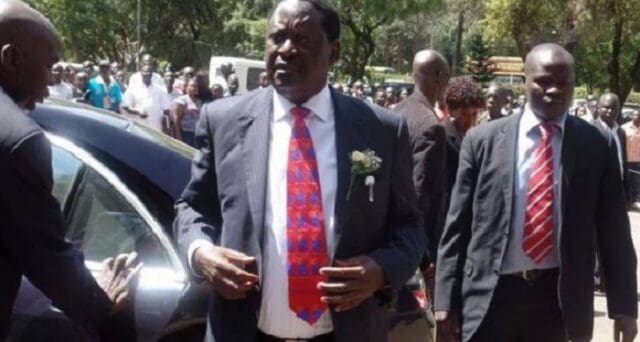 VIDEO: Drama As Raila's Bodyguard Blocked From VIP Stand at Kibaki's Funeral
